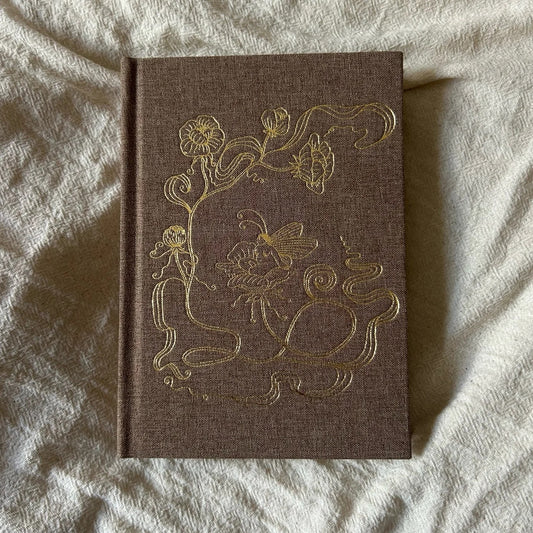 Frances Cannon Fairy Journal with gold-embossed fabric cover